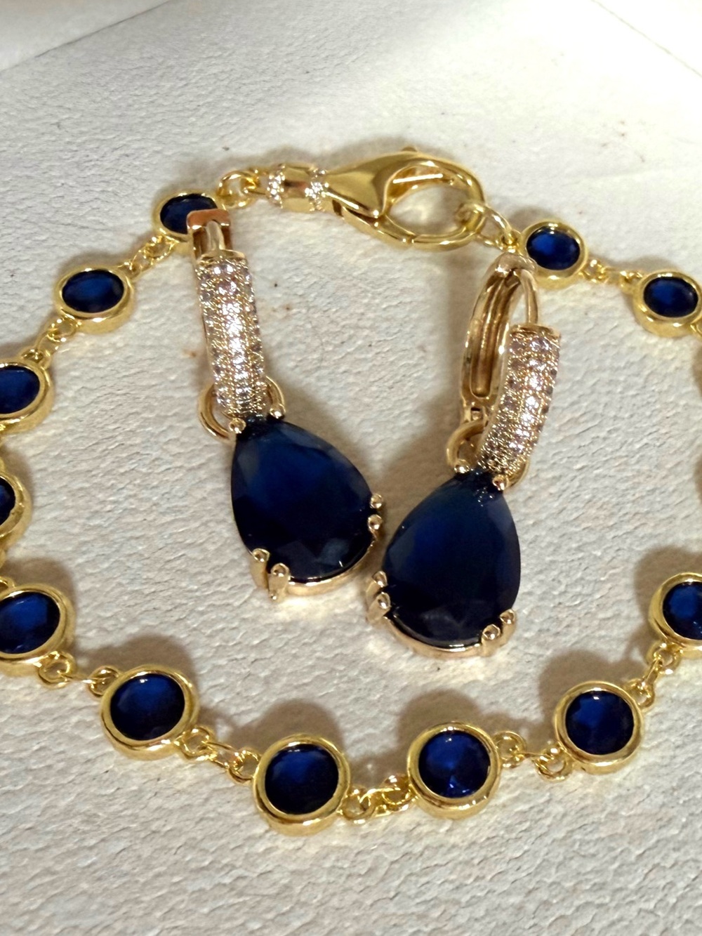 Gold-Plated Navy Blue Teardrop CZ Earrings with Matching Station Bracelet